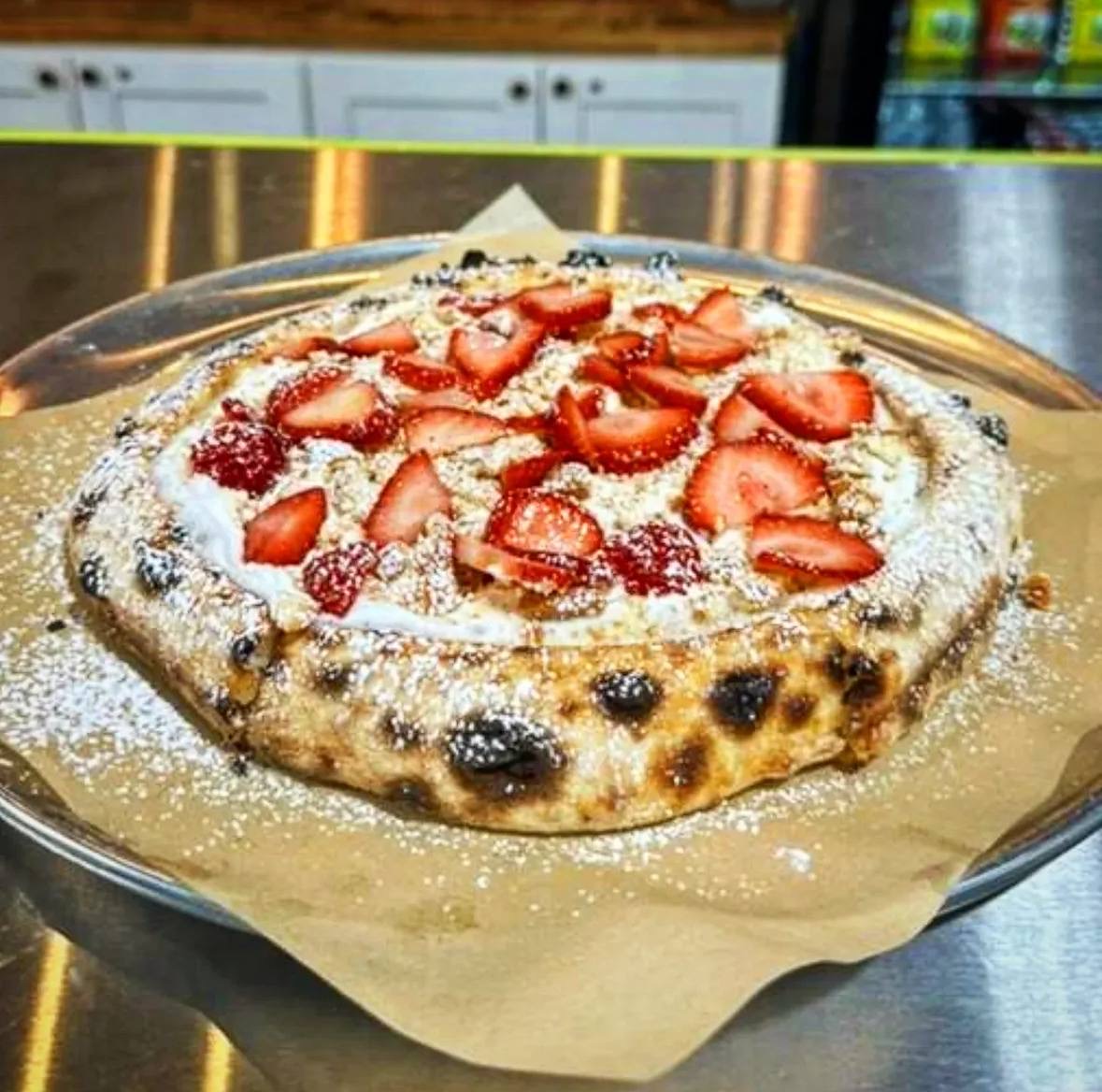 Dessert pizza with strawberries